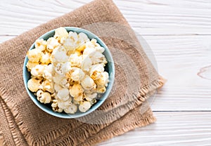 sweet popcorn on wood