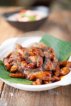 Sweet Pork Condiment (Thai name is muu waan) Thai streaky pork menu with coconut or palm sugar and black sauce