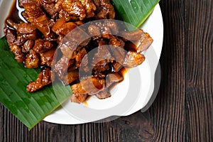 Sweet Pork Condiment (Thai name is muu waan) Thai streaky pork menu with coconut or palm sugar and black sauce
