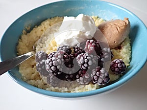 sweet porrifge with fruit and cream