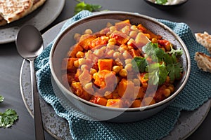 Sweet potato and chickpea curry with naan bread