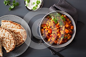 Sweet potato and chickpea curry with naan bread