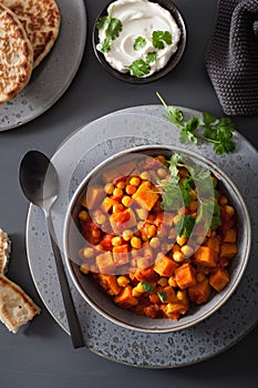 Sweet potato and chickpea curry with naan bread