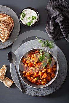 Sweet potato and chickpea curry with naan bread