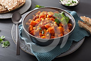 Sweet potato and chickpea curry with naan bread