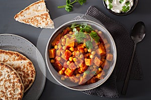 Sweet potato and chickpea curry with naan bread