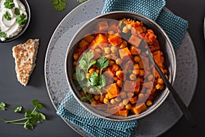 Sweet potato and chickpea curry with naan bread