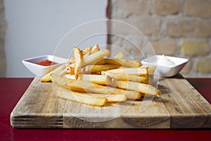 Sweet potato fries are potatoes that are made by cutting them into batons and frying them in hot oil until golden brown and crisp.