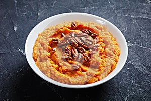 Sweet potato mash topped with pecan nuts