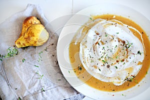 Sweet potato and rutabaga creamy soup with pears, herbs