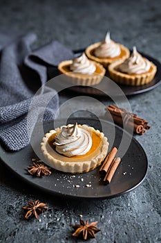 Sweet potato tartlets with torched Swiss meringue