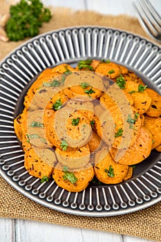 Sweet potatoes baked with garlic and baked thyme