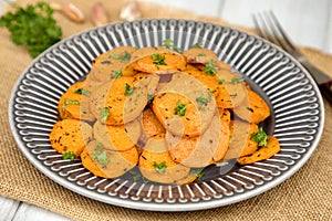 Sweet potatoes baked with garlic and baked thyme