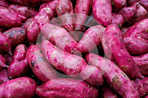 Sweet potatoes on a market stall