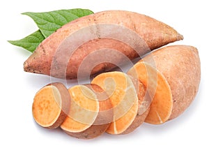 Sweet potatoes with sweet potato slices and batata leaves photo