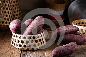 Sweet Potatoes Purple Colored on Table