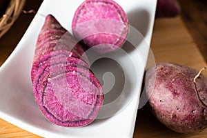 Sweet Potatoes Purple Colored on Table