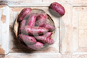 Sweet Potatoes Purple Colored on Table