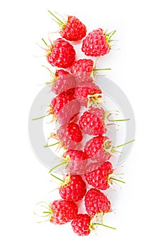Sweet raspberries on a white background in a row. Ripe summer fruits