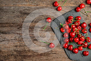 Sweet red cherries on slate plate