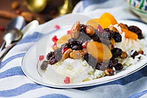 Sweet rice plov with dried fruits and nuts