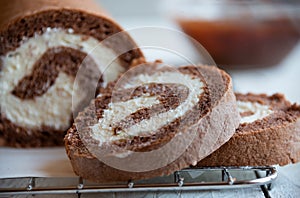 Sweet roll with wiped cream, delicious chocolate cake