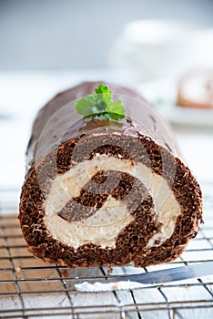 Sweet roll with wiped cream, delicious chocolate cake