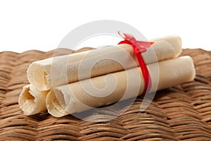 Sweet rolled wafers with red bow