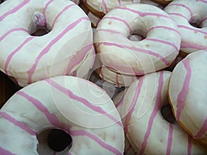 Sweet round color decorated donuts photo