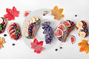 Sweet sandwiches assortment with chocolate nut butter and fruits