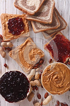 Sweet sandwiches with jam and peanut butter top view