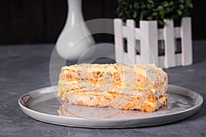 Sweet sans rival made with meringue layers filled with buttercream and cashew nuts photo