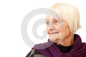 Sweet senior woman looking to the side