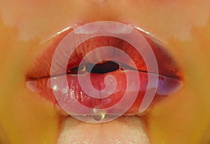 Sweet, sexy lips, temptation concept. Sweet taste on the female body, the face mouth closeup. Lips in honey. Sweet kiss