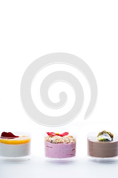 Sweet snacks in clear glasses for events. Catering.