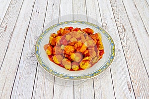 Sweet and sour is a generic term that encompasses many sauce styles, photo