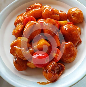 Sweet and Sour Pork with tomato and pine apple