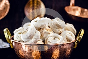 Sweet Suspiro or meringue is a homemade sweet made from egg whites and sugar. sigh, typical Brazilian dessert photo