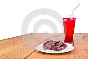 Sweet syrup, dates, simple iftar break fast food during Ramadan