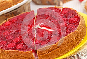 Sweet tart with red raspberries photo