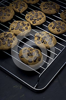 Sweet and tasty vegan cookies, made of chickpeas, peanut butter, dates and vegan chocolate photo