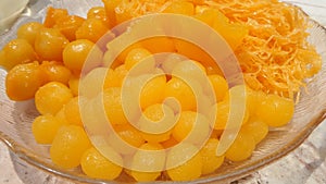 Sweet Thai dessert in syrup made from egg yolks