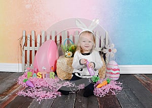 Sweet toddler girl at easter with headband