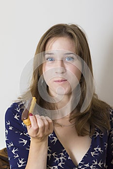 Sweet tooth girl eating eclairs