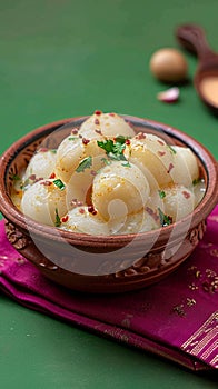 Sweet tradition Rasgulla, a Bengali delicacy served in clayware