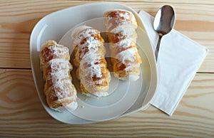 Sweet tubes filled egg white, Czech confection called Kremrole.