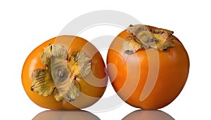 Sweet, vitaminized persimmon fruit on white