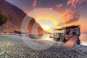 Sweet Water Beach in south Crete, with its unique tavern on the rock inside sea.