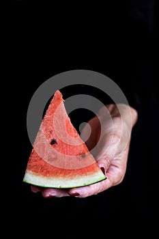 Sweet watermelon in woman hand