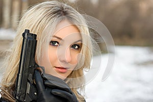 Sweet woman with a weapon